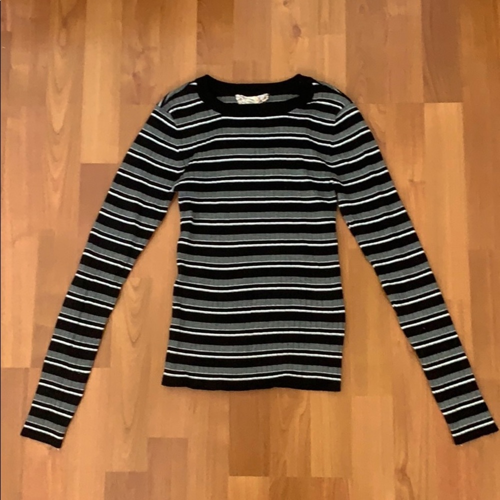 Black, grey, and white striped long-sleeved shirt